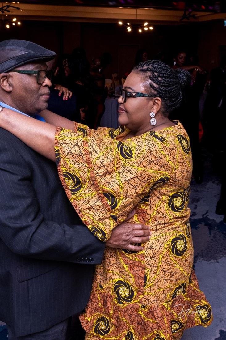 A couple slow dancing